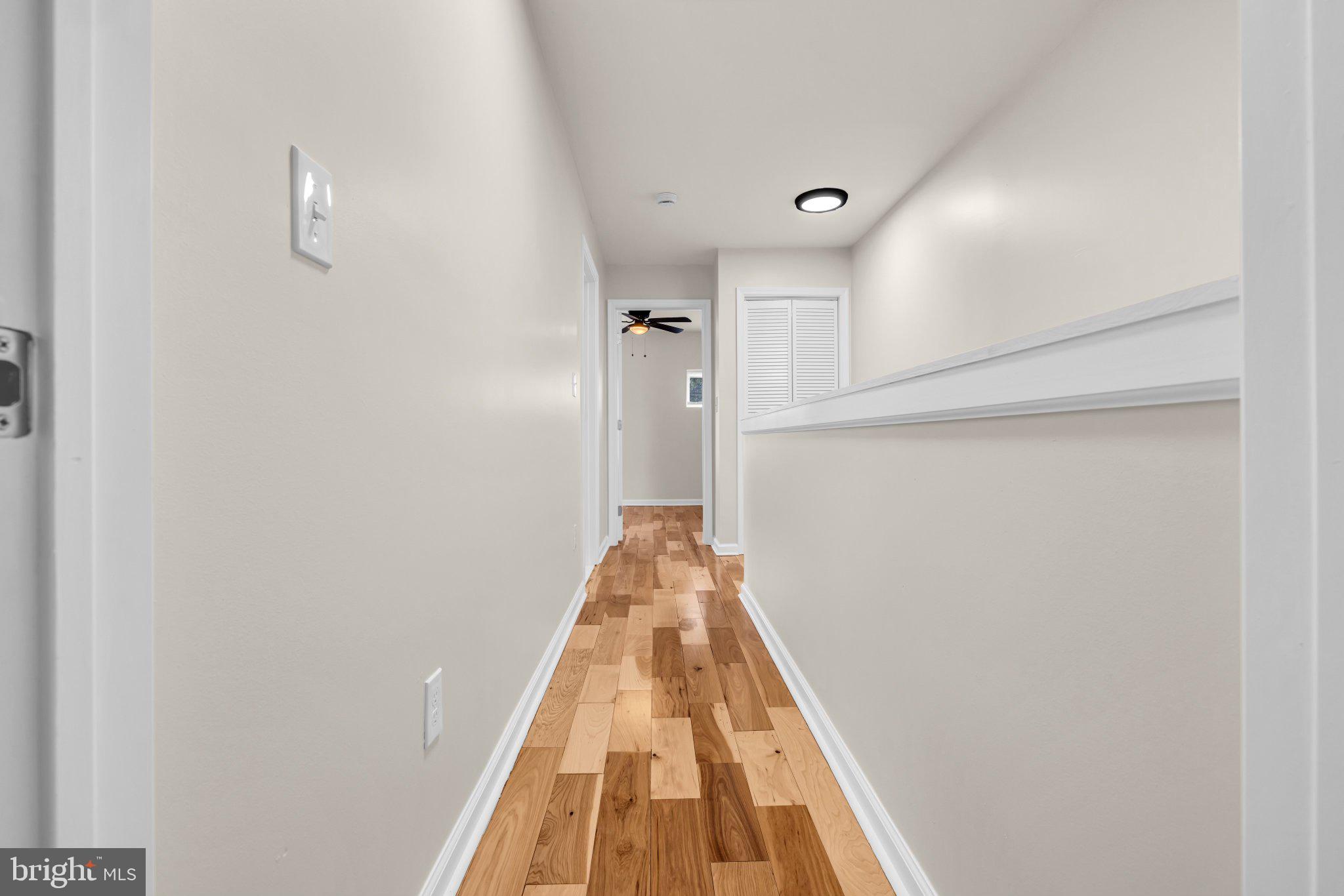 1622 Hazel Street Baltimore, MD 21226 - Photo 17 of 40 Inviting hallway with warm wood tones.