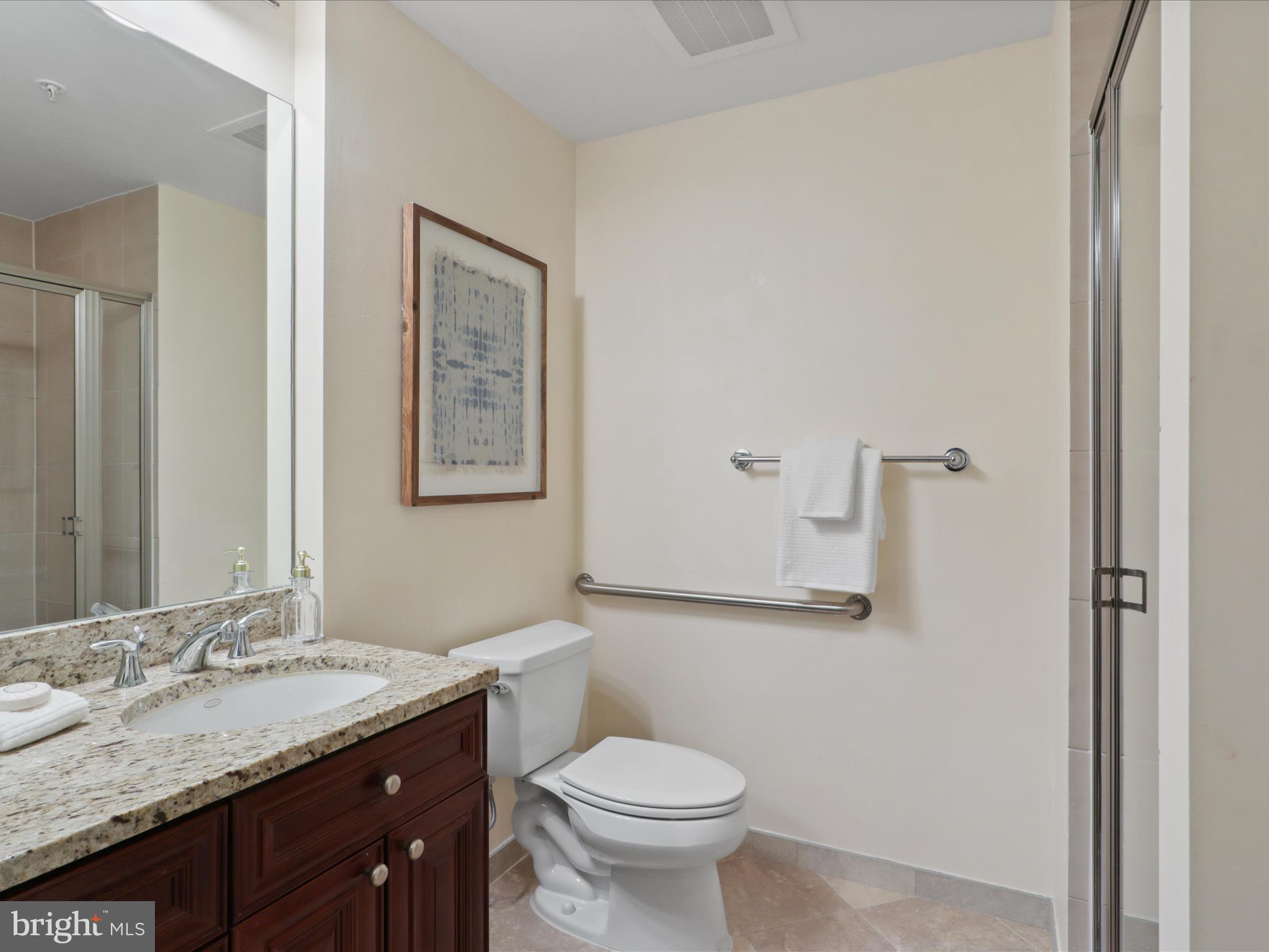 11990 Market Street, Unit 1406 Reston, VA 20190 - Photo 12 of 38 Second full bath with standup shower
