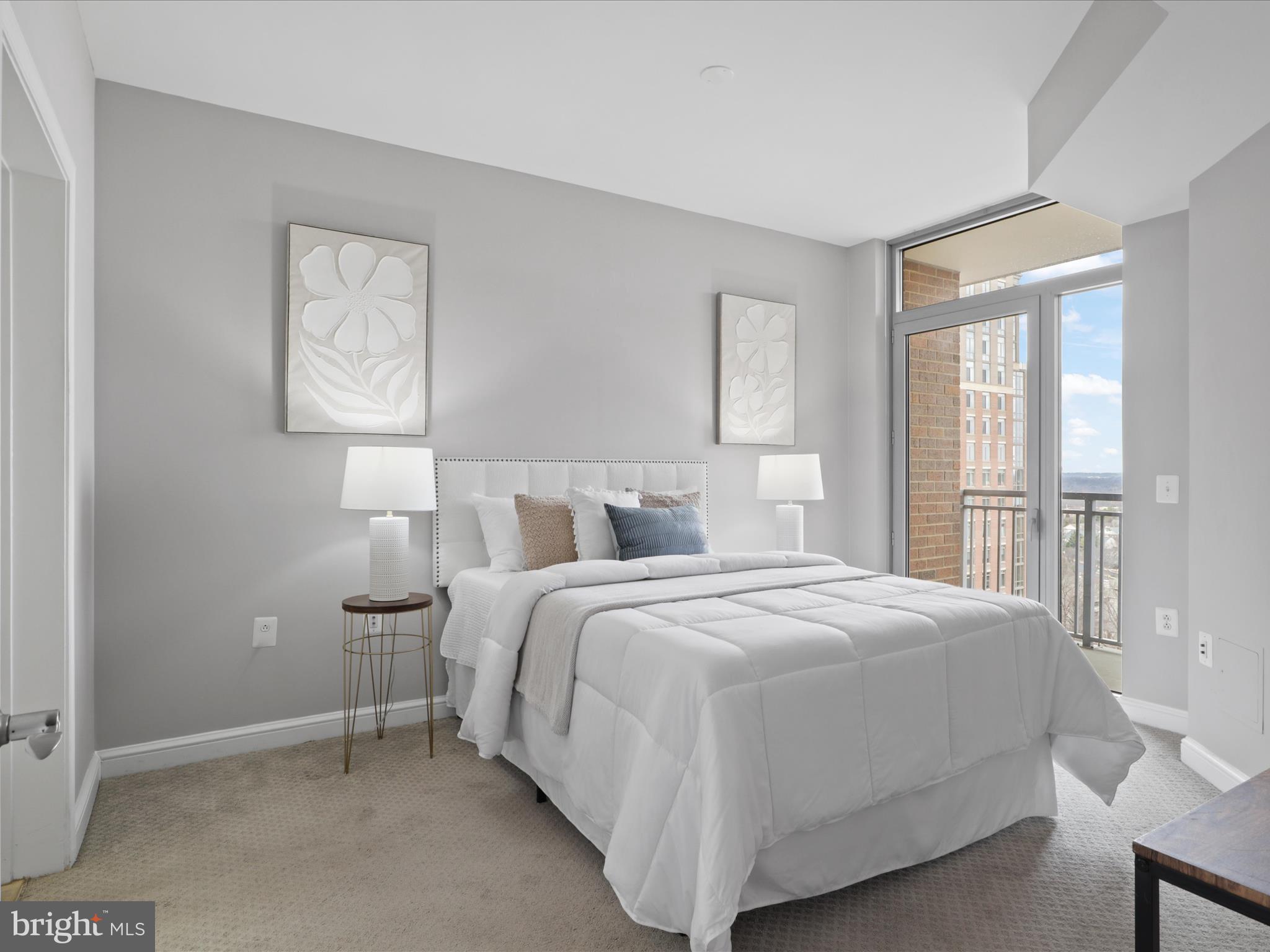 11990 Market Street, Unit 1406 Reston, VA 20190 - Photo 13 of 38 Primary bedroom with balcony