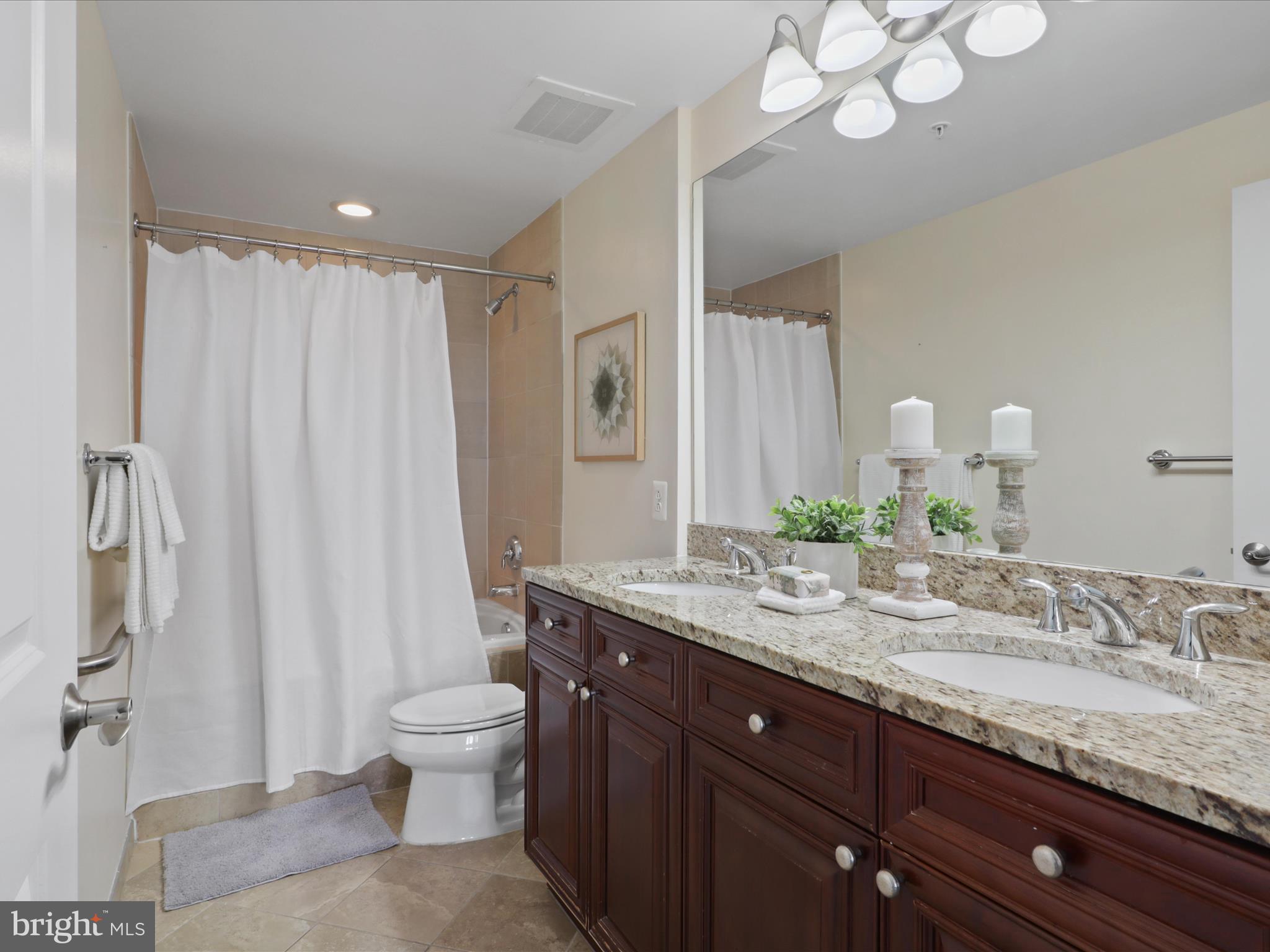 11990 Market Street, Unit 1406 Reston, VA 20190 - Photo 16 of 38 Dual vanity in primary bath