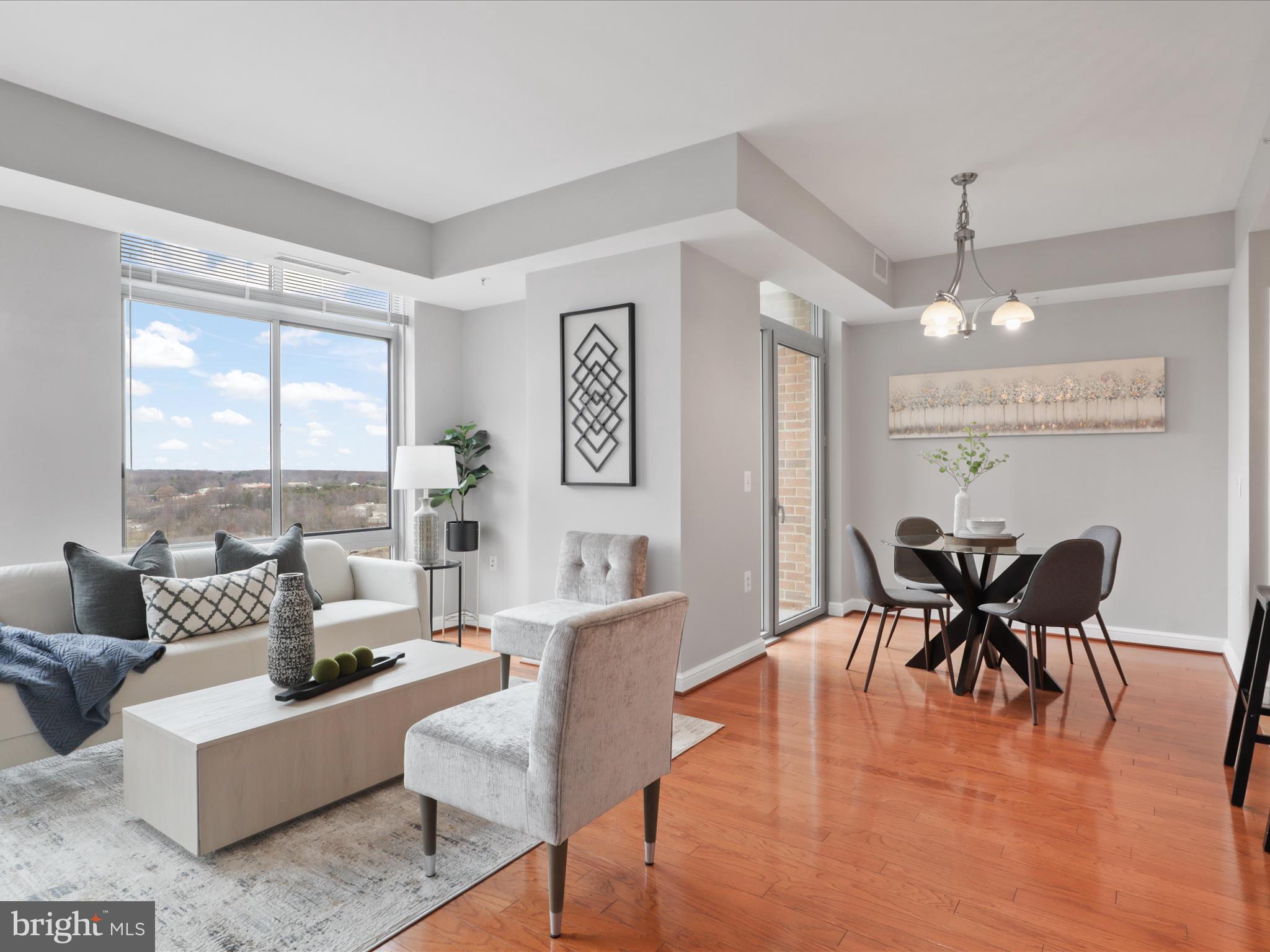 11990 Market Street, Unit 1406 Reston, VA 20190 - Photo 3 of 38 Living and dining spaces