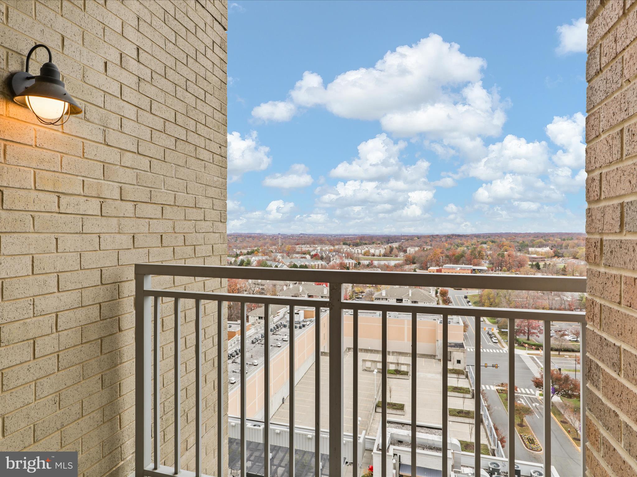 11990 Market Street, Unit 1406 Reston, VA 20190 - Photo 6 of 38 Balcony off Dining Room