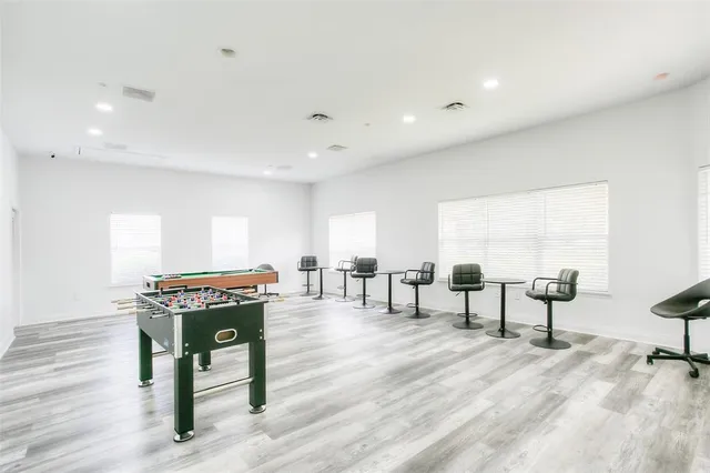 a room with lots of gym equipment