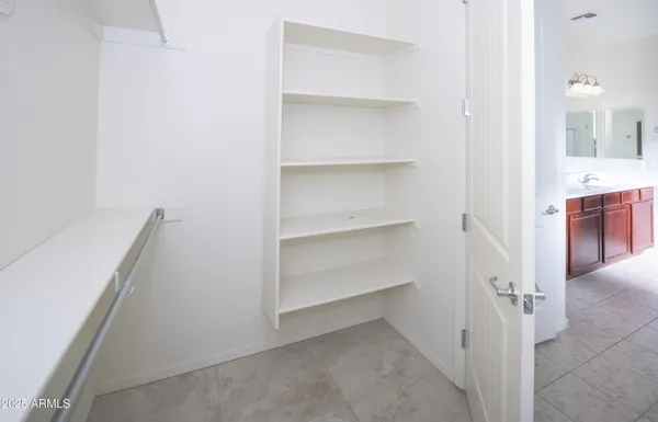 a view of a hallway with closet