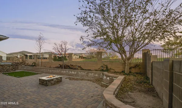 a view of a park with large trees
