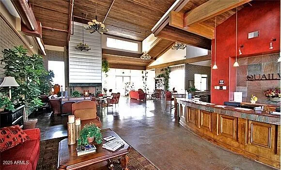 a kitchen with stainless steel appliances granite countertop wooden cabinets a sink and a stove
