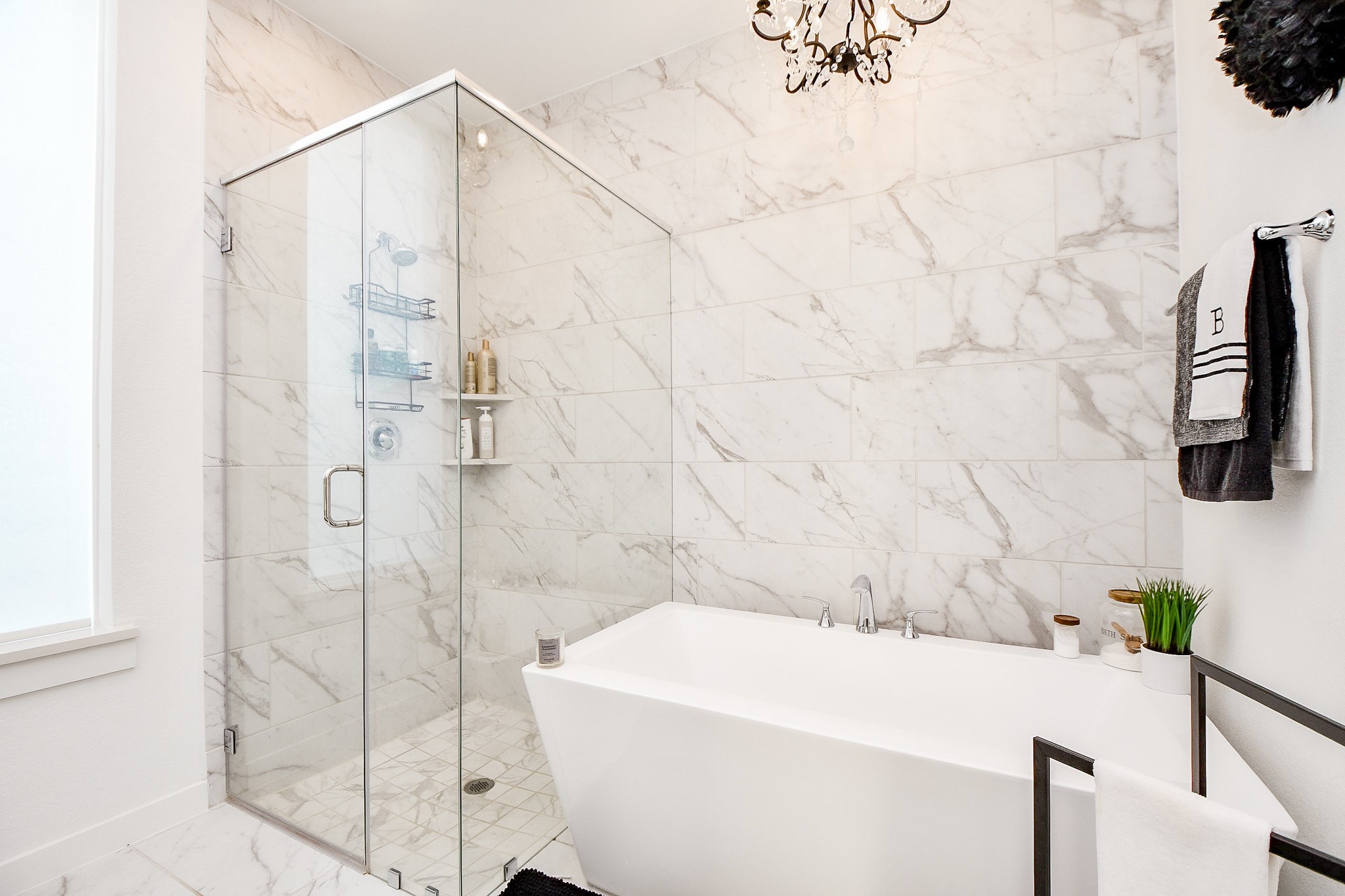 5102 Pomegranate Path Manvel, TX 77578 - Photo 25 of 33 a bathroom with a bathtub and shower