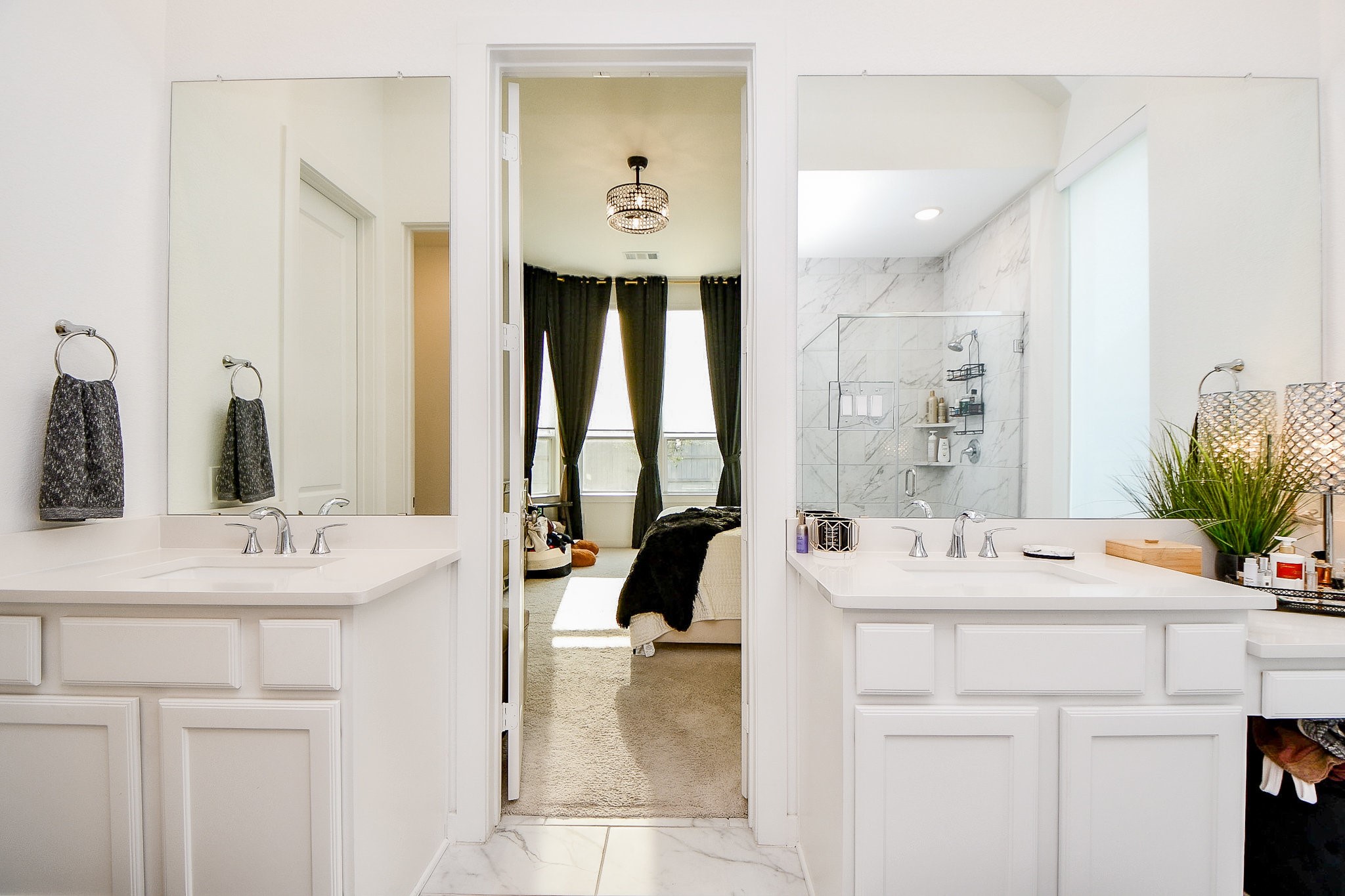 5102 Pomegranate Path Manvel, TX 77578 - Photo 26 of 33 a bathroom with a sink double vanity and a mirror