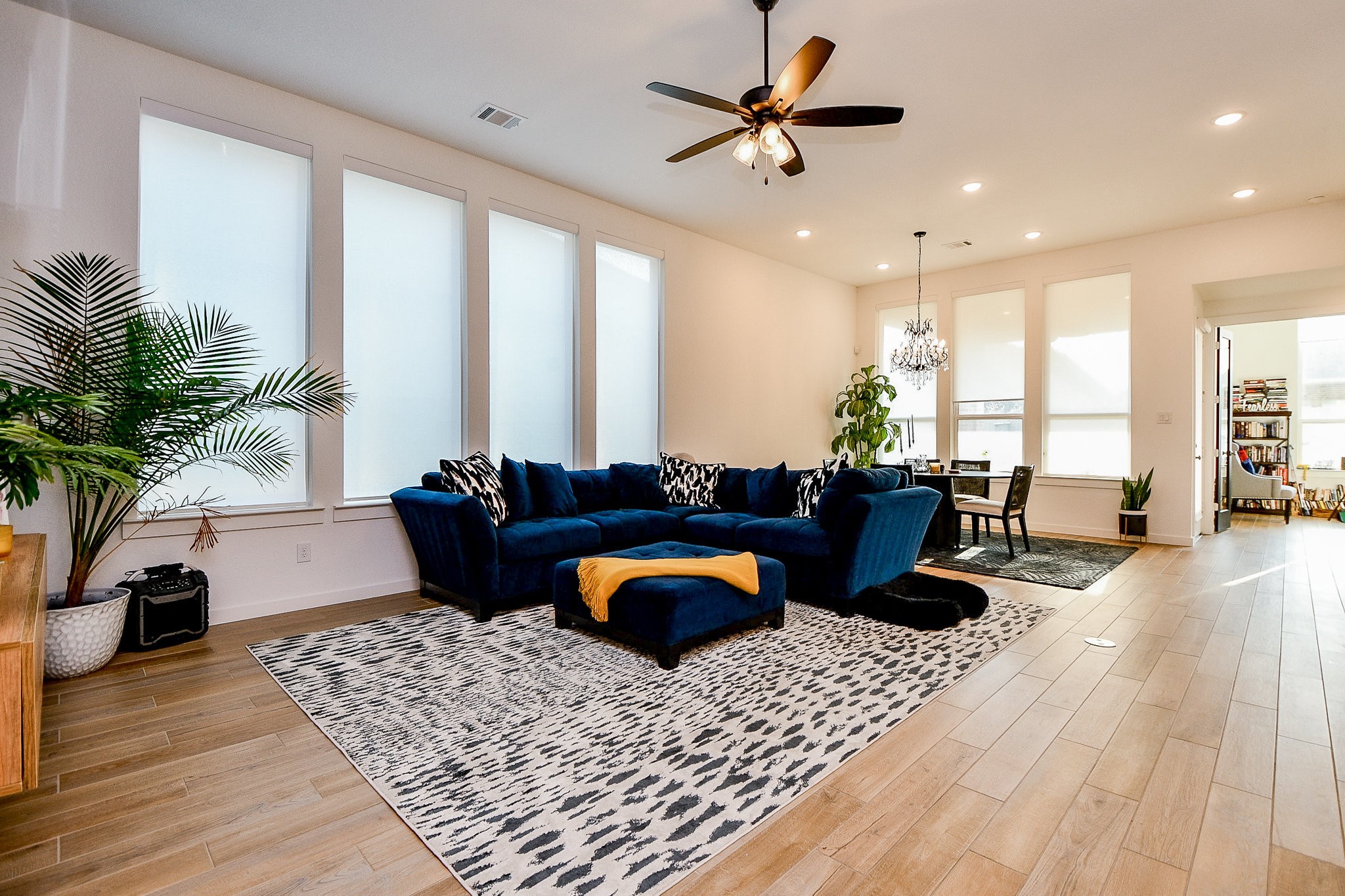 5102 Pomegranate Path Manvel, TX 77578 - Photo 7 of 33 a living room with furniture rug and a potted plant
