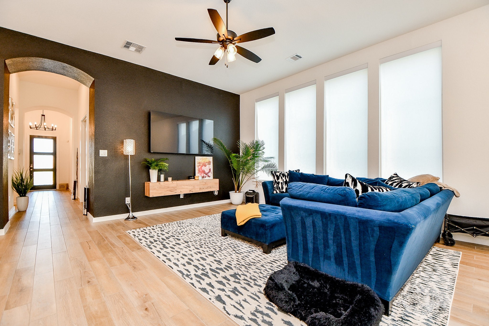 5102 Pomegranate Path Manvel, TX 77578 - Photo 8 of 33 a living room with furniture and a flat screen tv