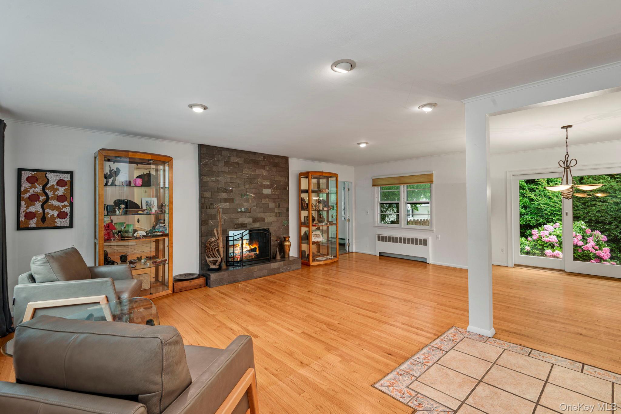 75 Cove Road Huntington, NY 11743 - Photo 5 of 38 Open Living to dining area