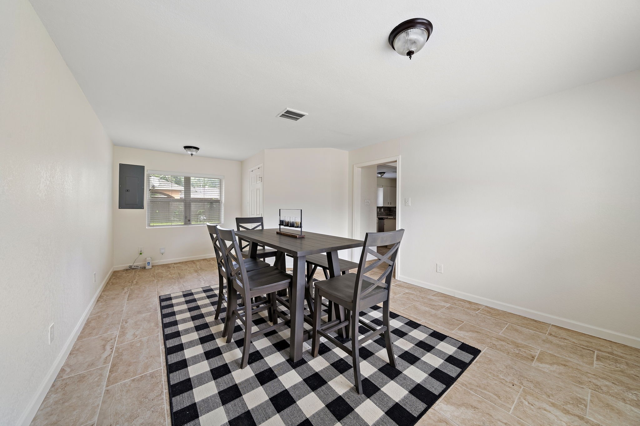 5914 Darnell Street Houston, TX 77074 - Photo 11 of 20 Garage was converted to a large formal dining room with the utility room attached.