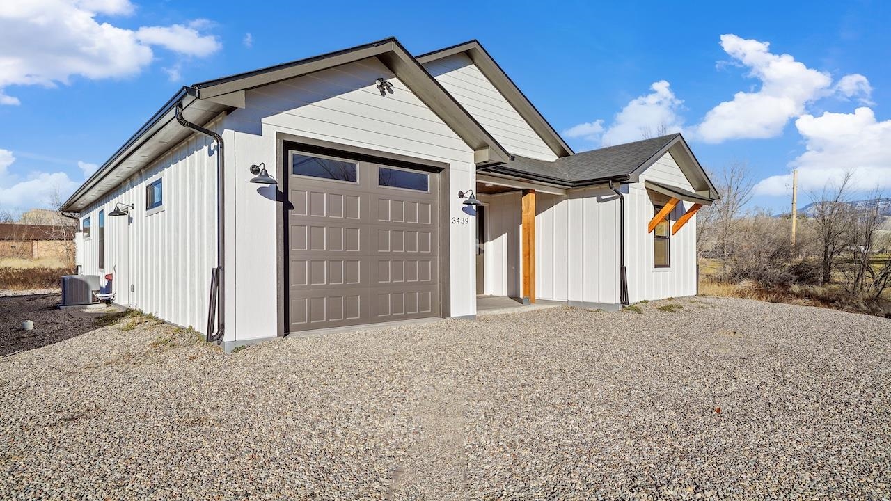 3439 D Road Palisade, CO 81526 - Photo 23 of 29 a view of a house with a yard