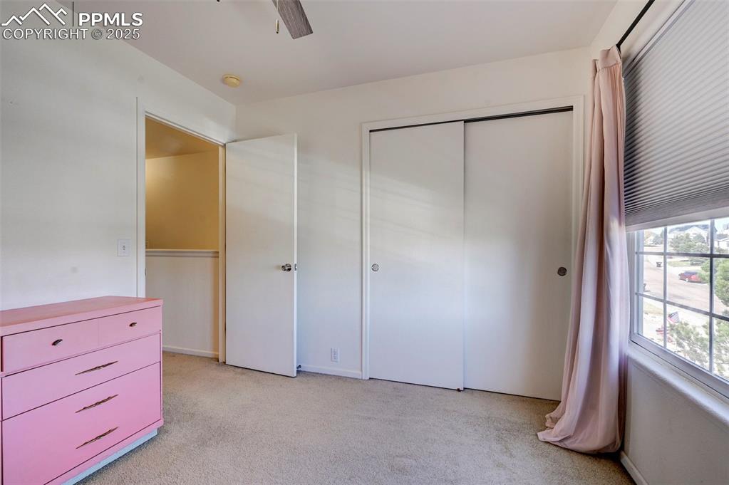 9332 Bethpage Road Peyton, CO 80831 - Photo 19 of 32 a view of room with window and cabinet