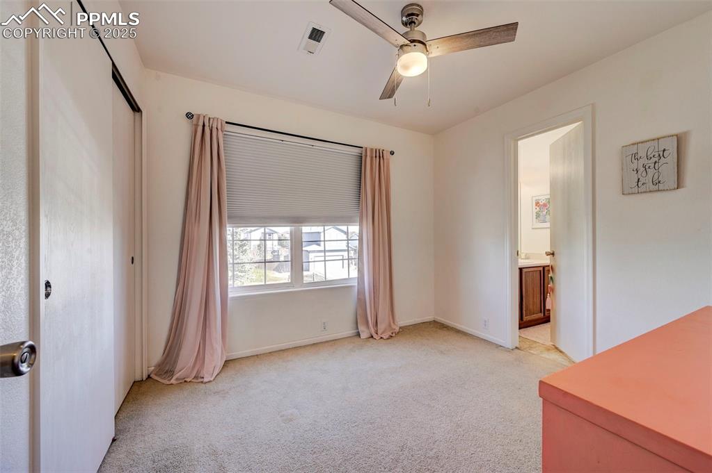 9332 Bethpage Road Peyton, CO 80831 - Photo 20 of 32 a view of an empty room with a window
