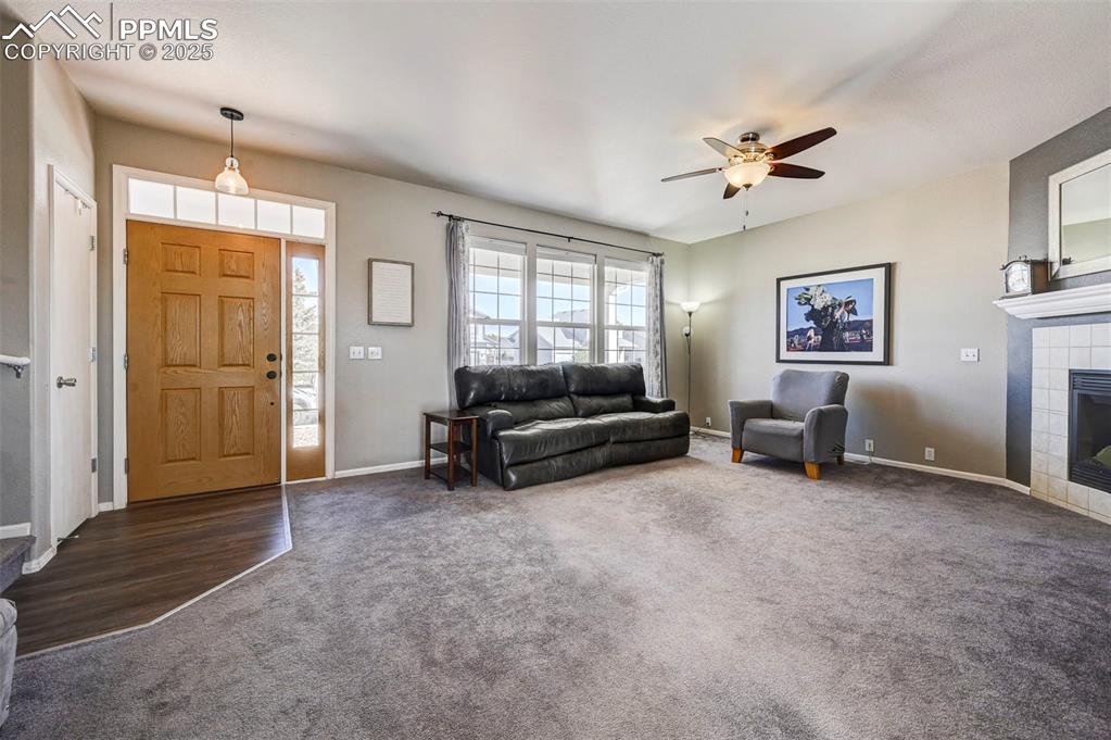 9332 Bethpage Road Peyton, CO 80831 - Photo 2 of 32 a living room with furniture and a window