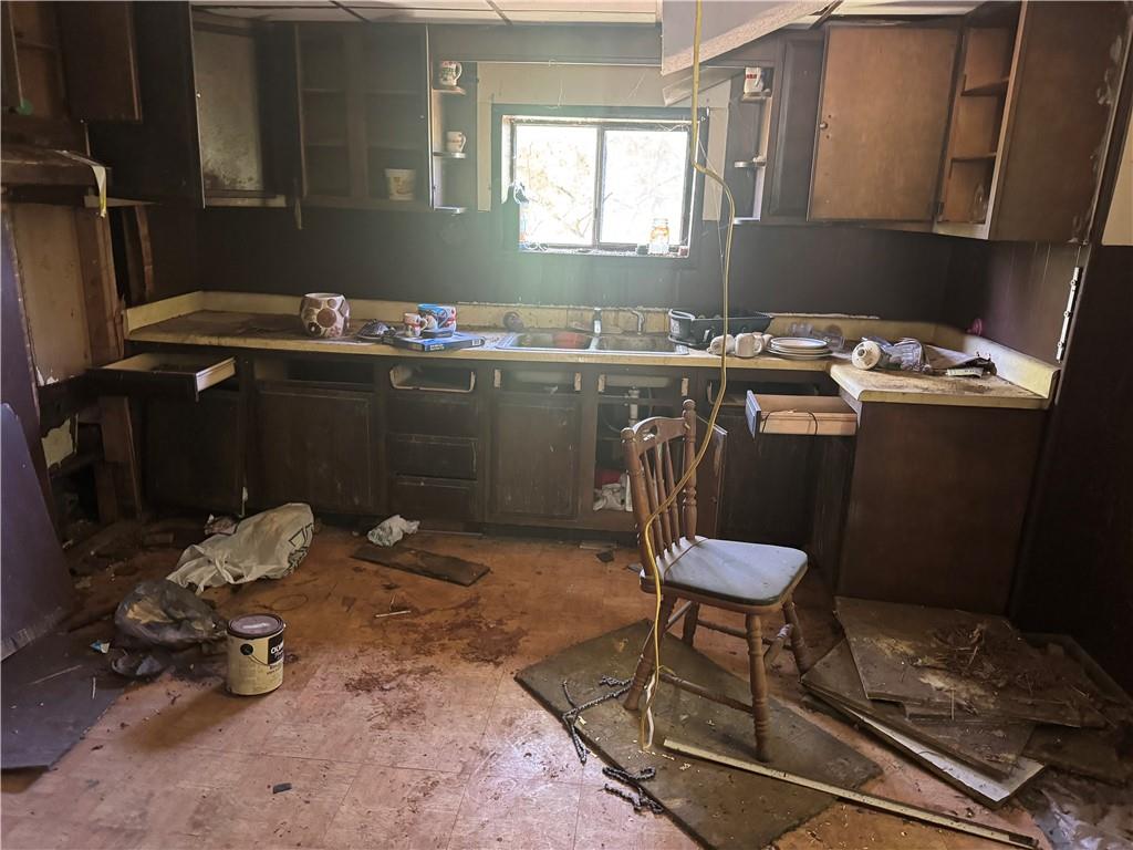 647 Filbert Heights Road New Salem, PA 15468 - Photo 1 of 14 a room with water heater and a table