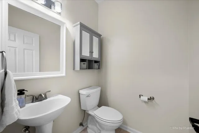 a bedroom with bed and a window