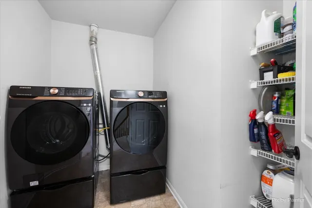 a bedroom with a bed window and flat screen tv