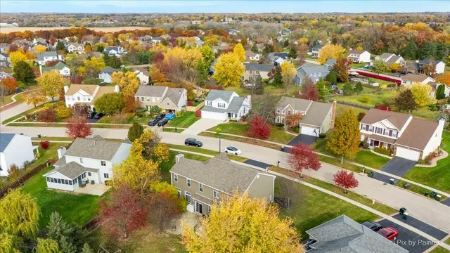 a bathroom with a tub shower and window