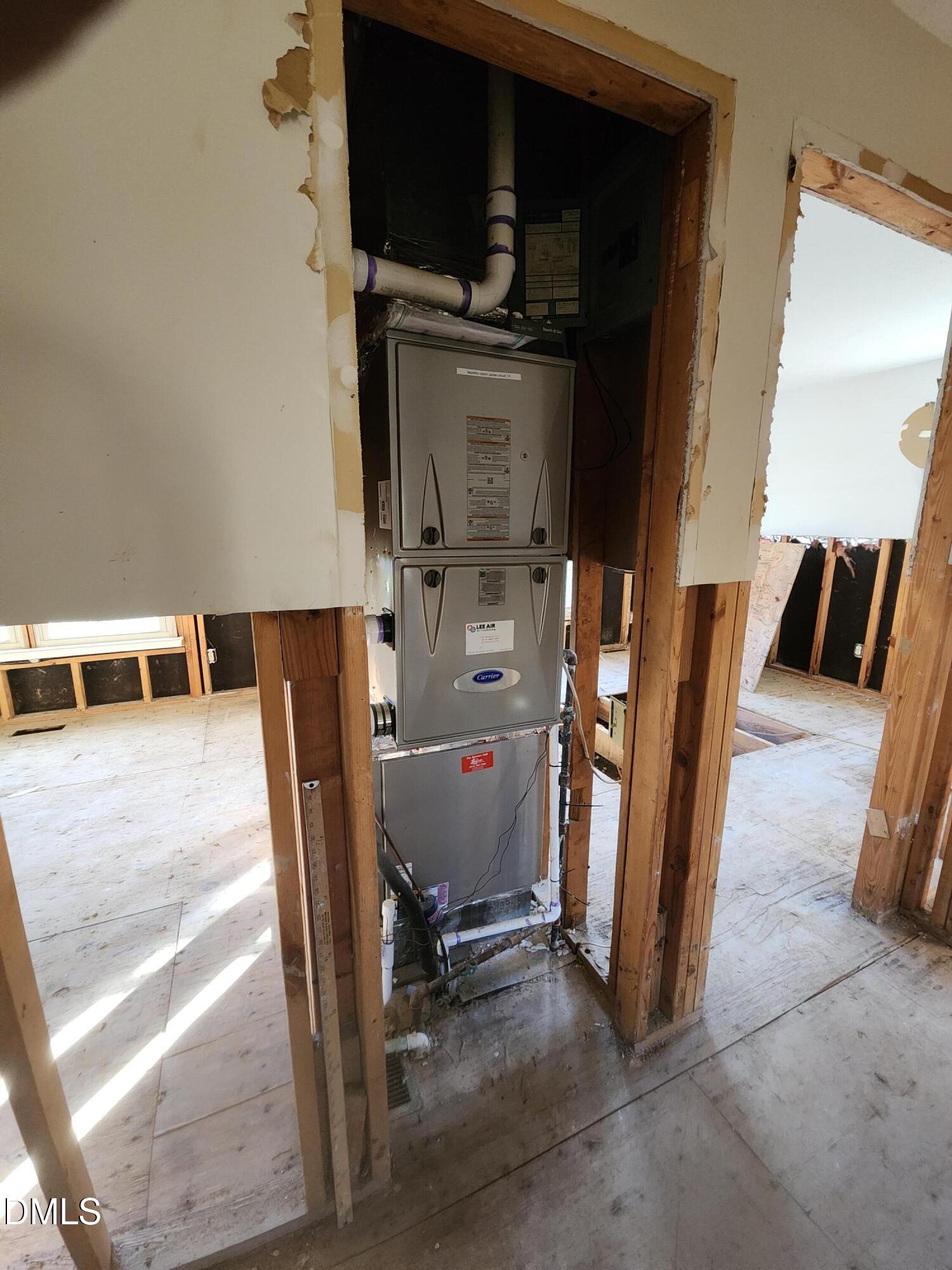 309 Rippling Stream Road Durham, NC 27704 - Photo 18 of 36 a view of walk in closet