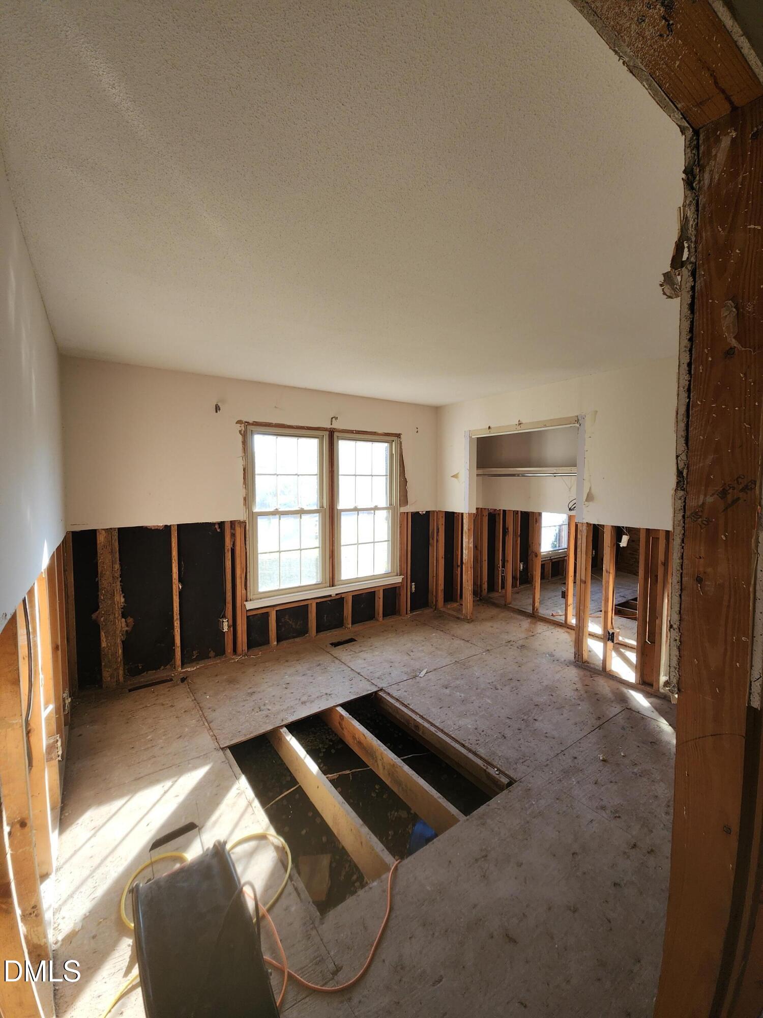 309 Rippling Stream Road Durham, NC 27704 - Photo 23 of 36 a view of livingroom with furniture and windows