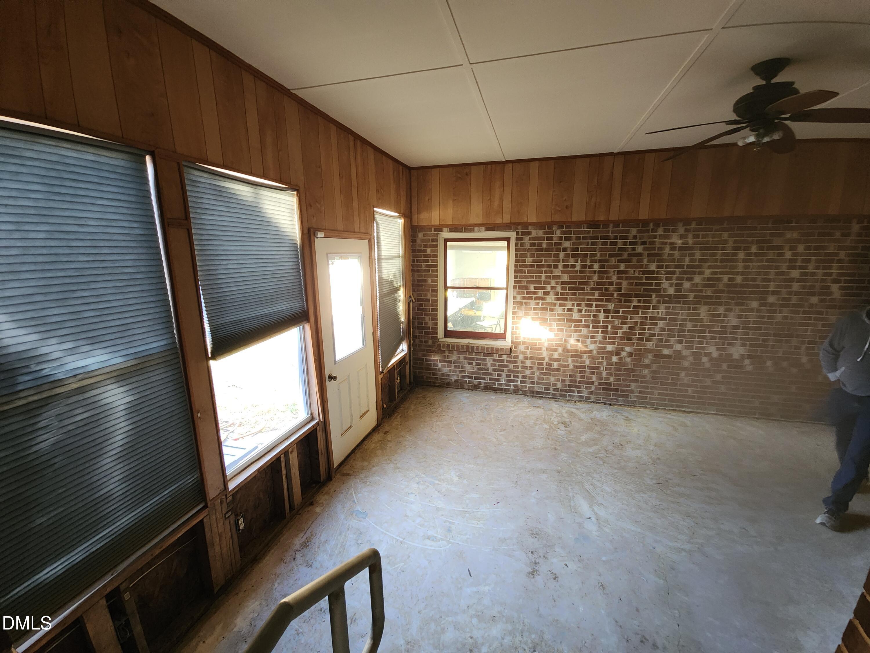 309 Rippling Stream Road Durham, NC 27704 - Photo 30 of 36 a view of an empty room and window