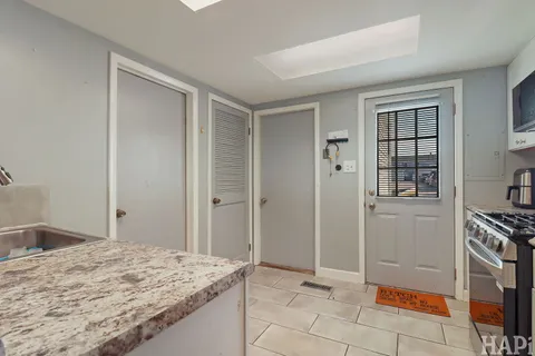 a view of kitchen and utility room