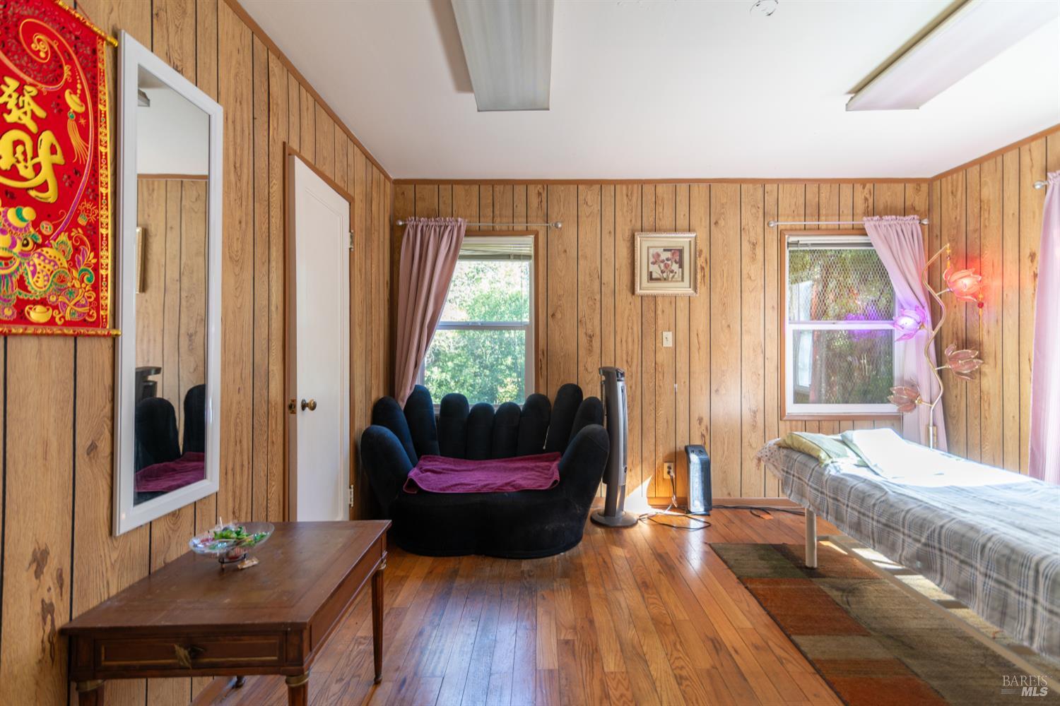 1852 4th Street Santa Rosa, CA 95404 - Photo 22 of 39 a living room with furniture and a large window
