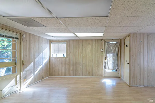 a view of entryway with wooden floor