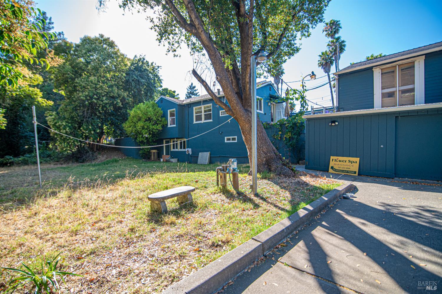 1852 4th Street Santa Rosa, CA 95404 - Photo 33 of 39 a view of a wooden deck with a bench