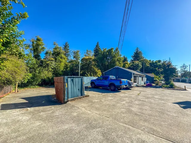 a view of a two chairs in the patio