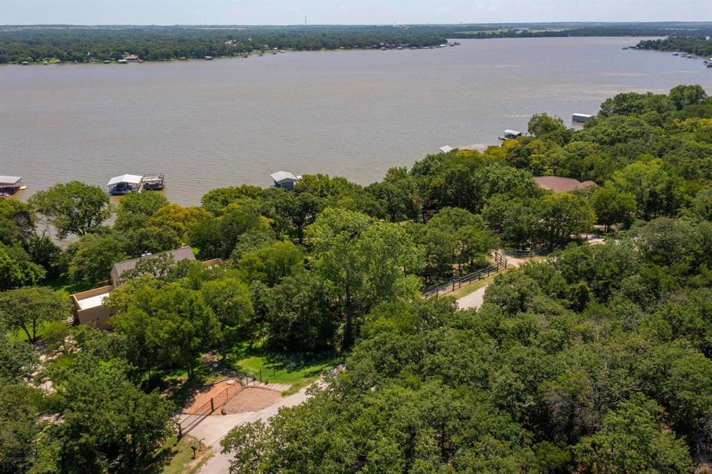 0 Eagle Point North Azle, TX 76020 - Photo 3 of 8 a view of a lake from a yard