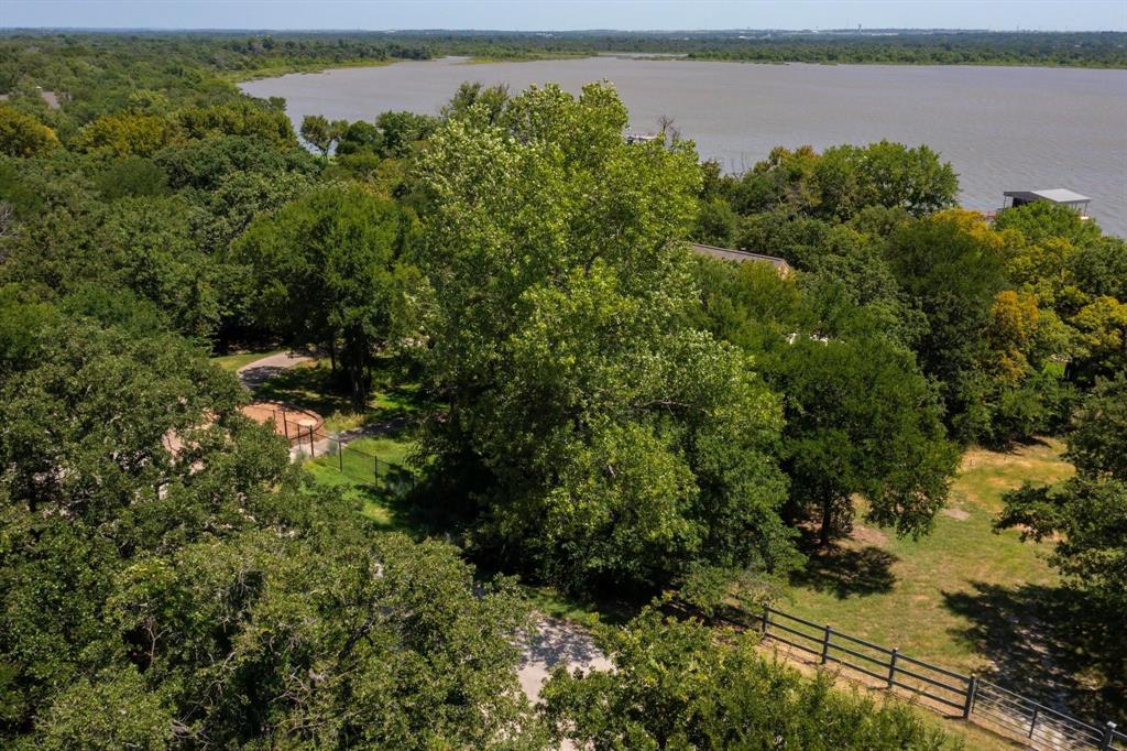 0 Eagle Point North Azle, TX 76020 - Photo 5 of 8 a view of a lake with a house