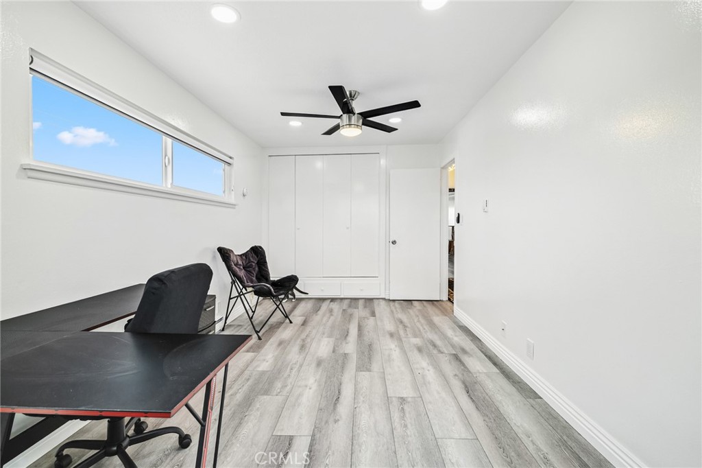 1349 Edgewood Way, Unit 49 Oxnard, CA 93030 - Photo 17 of 32 a workspace with furniture and chandelier