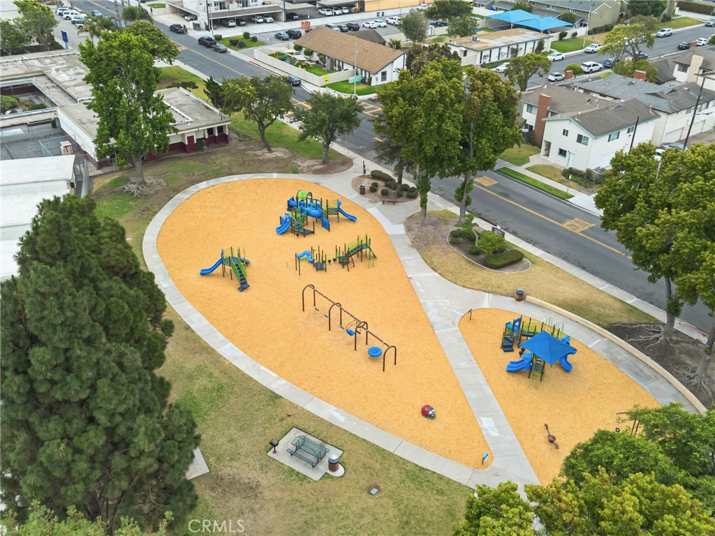 1349 Edgewood Way, Unit 49 Oxnard, CA 93030 - Photo 28 of 32 an aerial view of a swimming pool with outdoor seating and yard