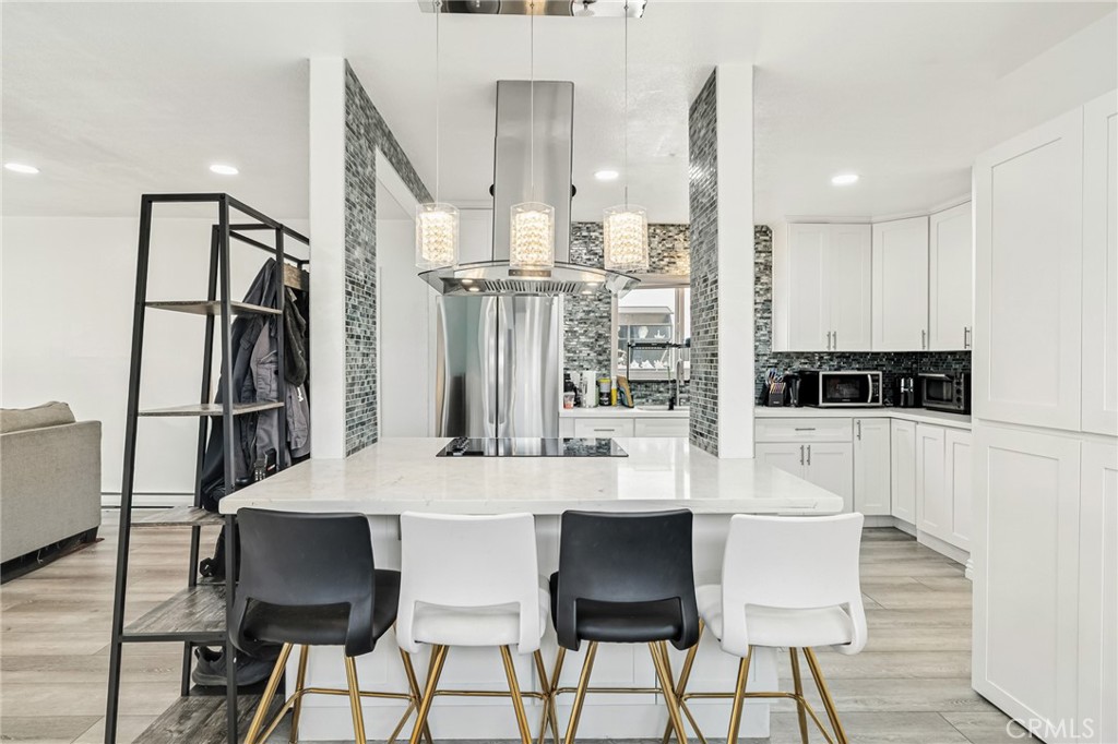 1349 Edgewood Way, Unit 49 Oxnard, CA 93030 - Photo 5 of 32 a view of a dining room with furniture