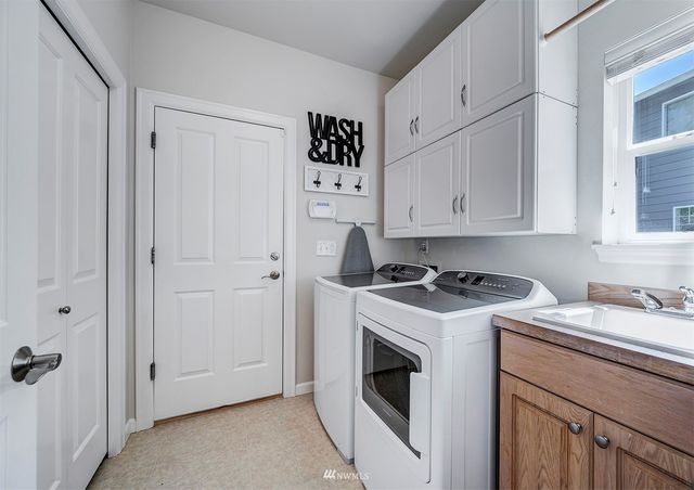 a view of kitchen and utility room