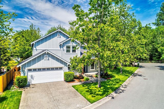 a view of a park with swings and slides