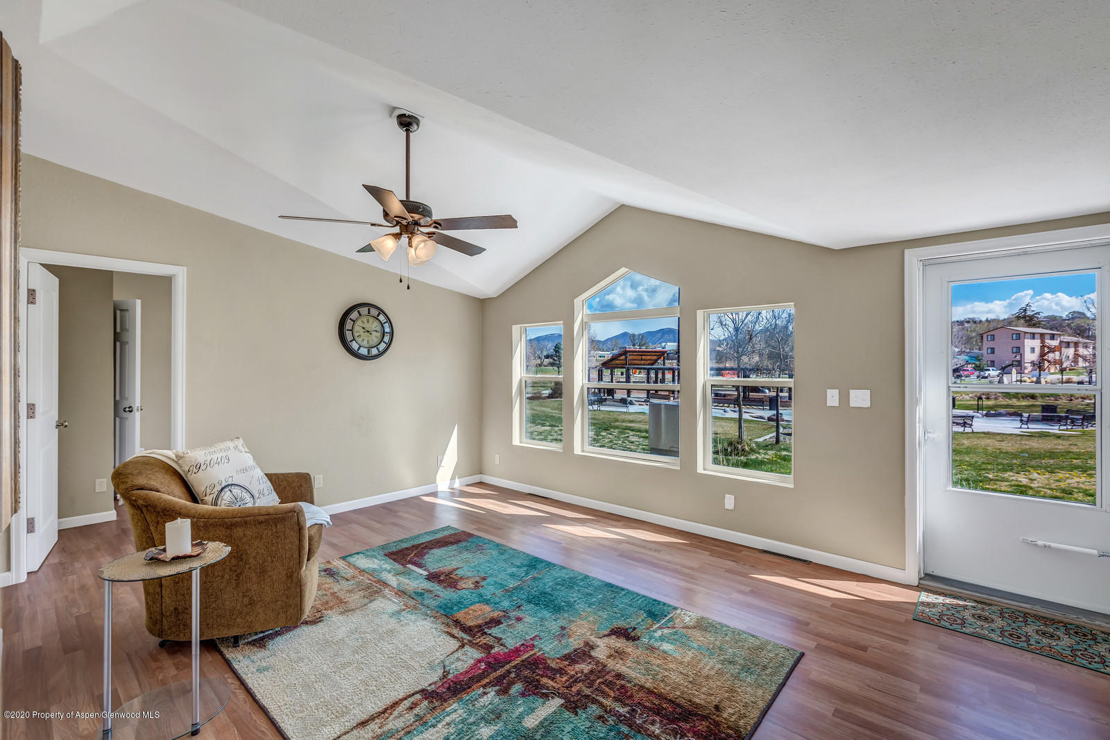 353 West 5th Street Rifle, CO 81650 - Photo 1 of 11 a living room with furniture and a window