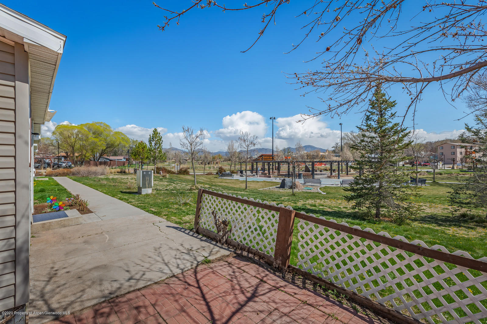 353 West 5th Street Rifle, CO 81650 - Photo 11 of 11 a view of a pathway with a wrought fence