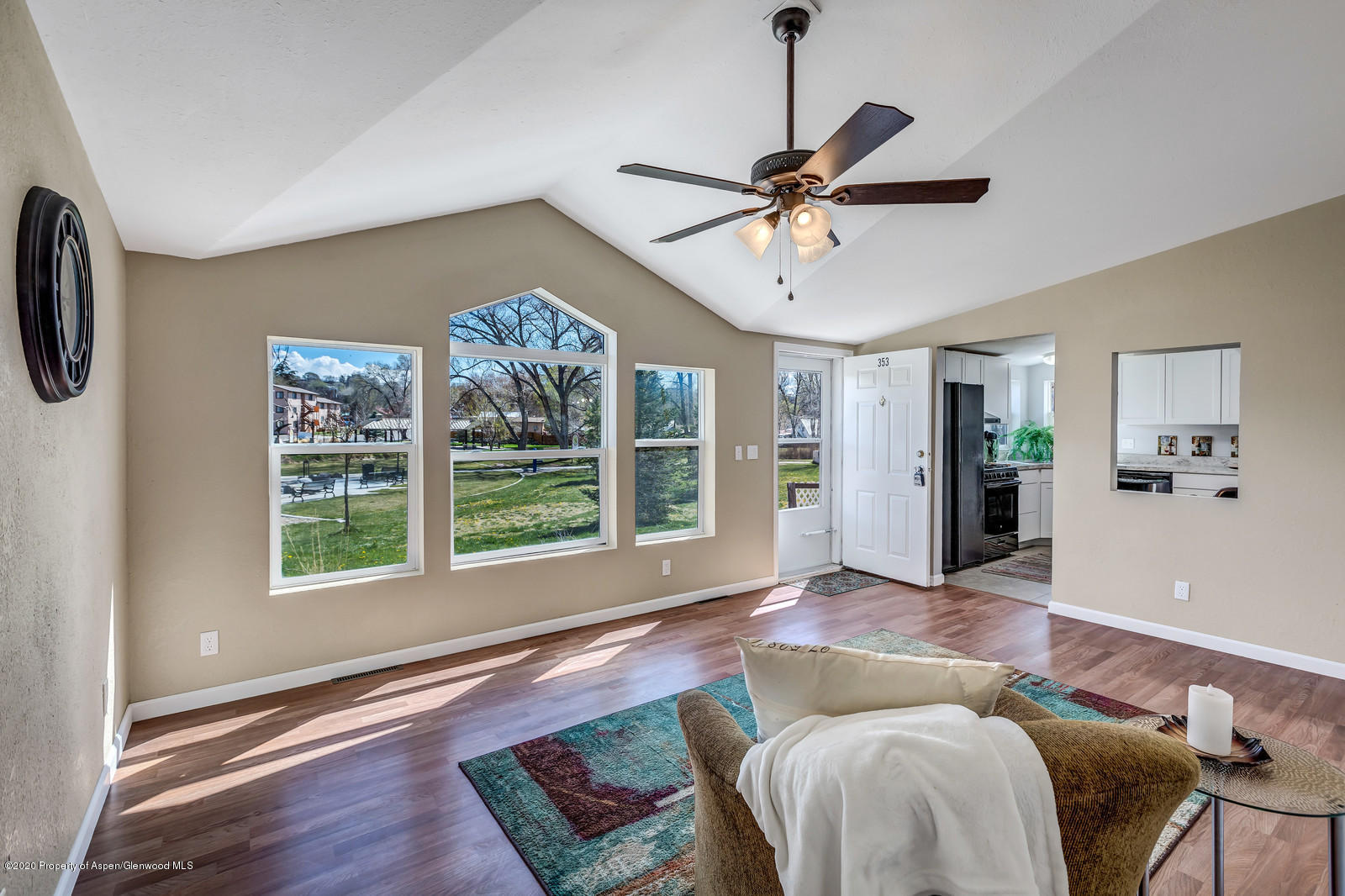 353 West 5th Street Rifle, CO 81650 - Photo 2 of 11 a living room with furniture and a window
