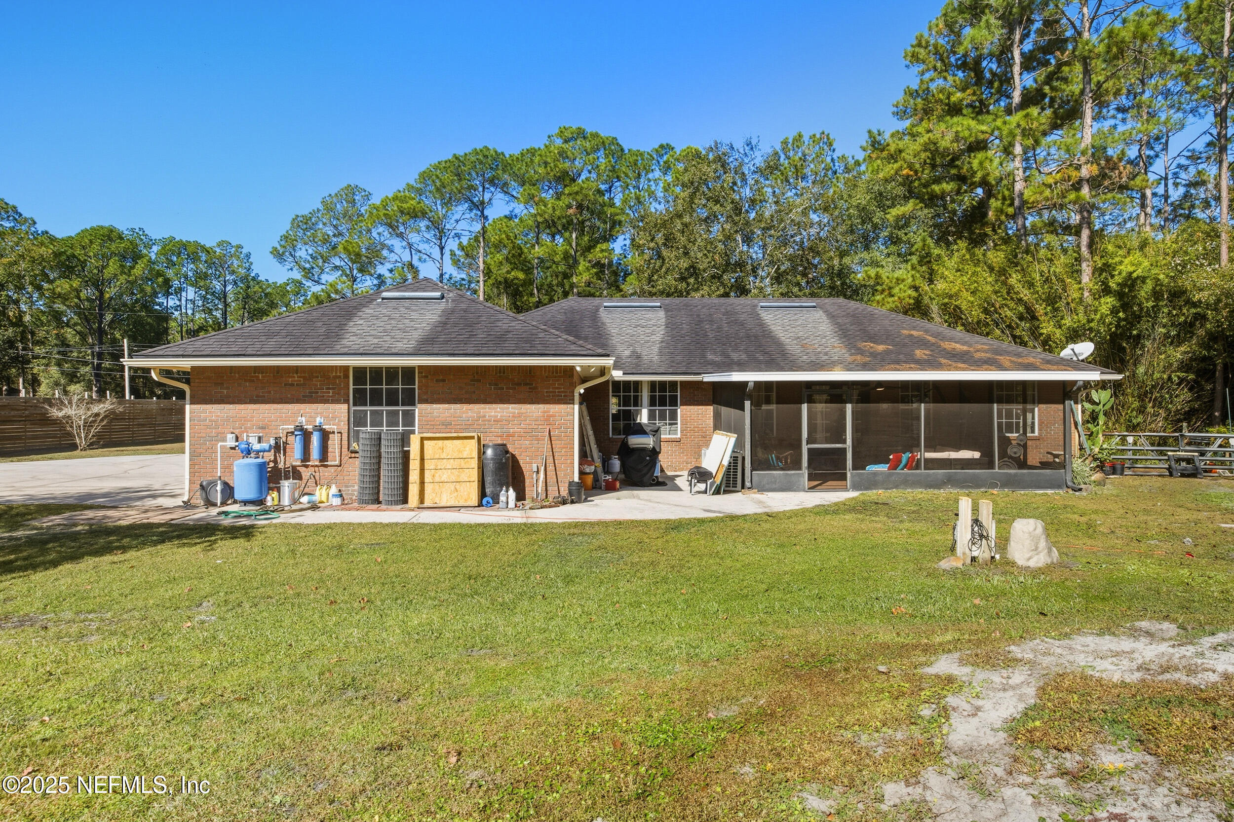 5720 Younis Road South Jacksonville, FL 32218 - Photo 14 of 34 a front view of a house with a garden