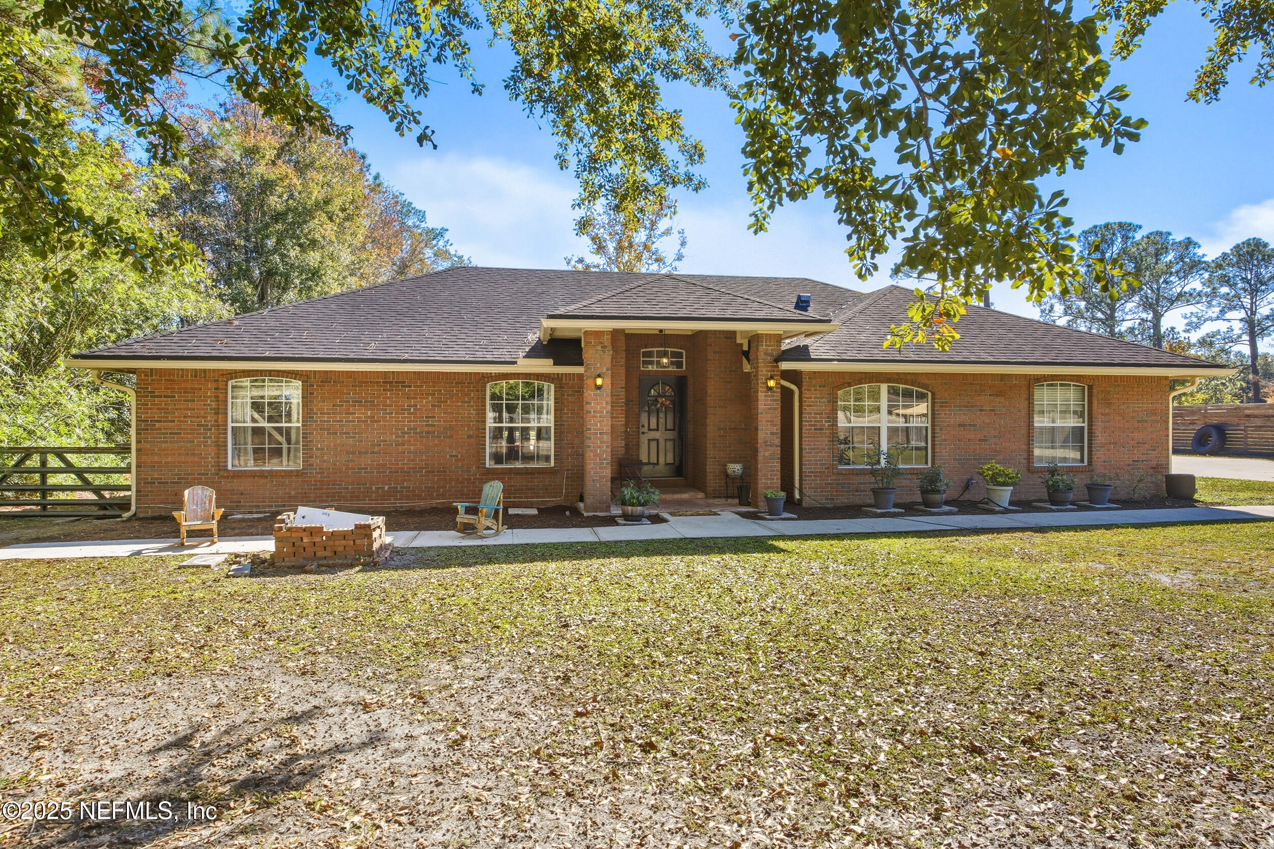 5720 Younis Road South Jacksonville, FL 32218 - Photo 2 of 34 a front view of a house with patio