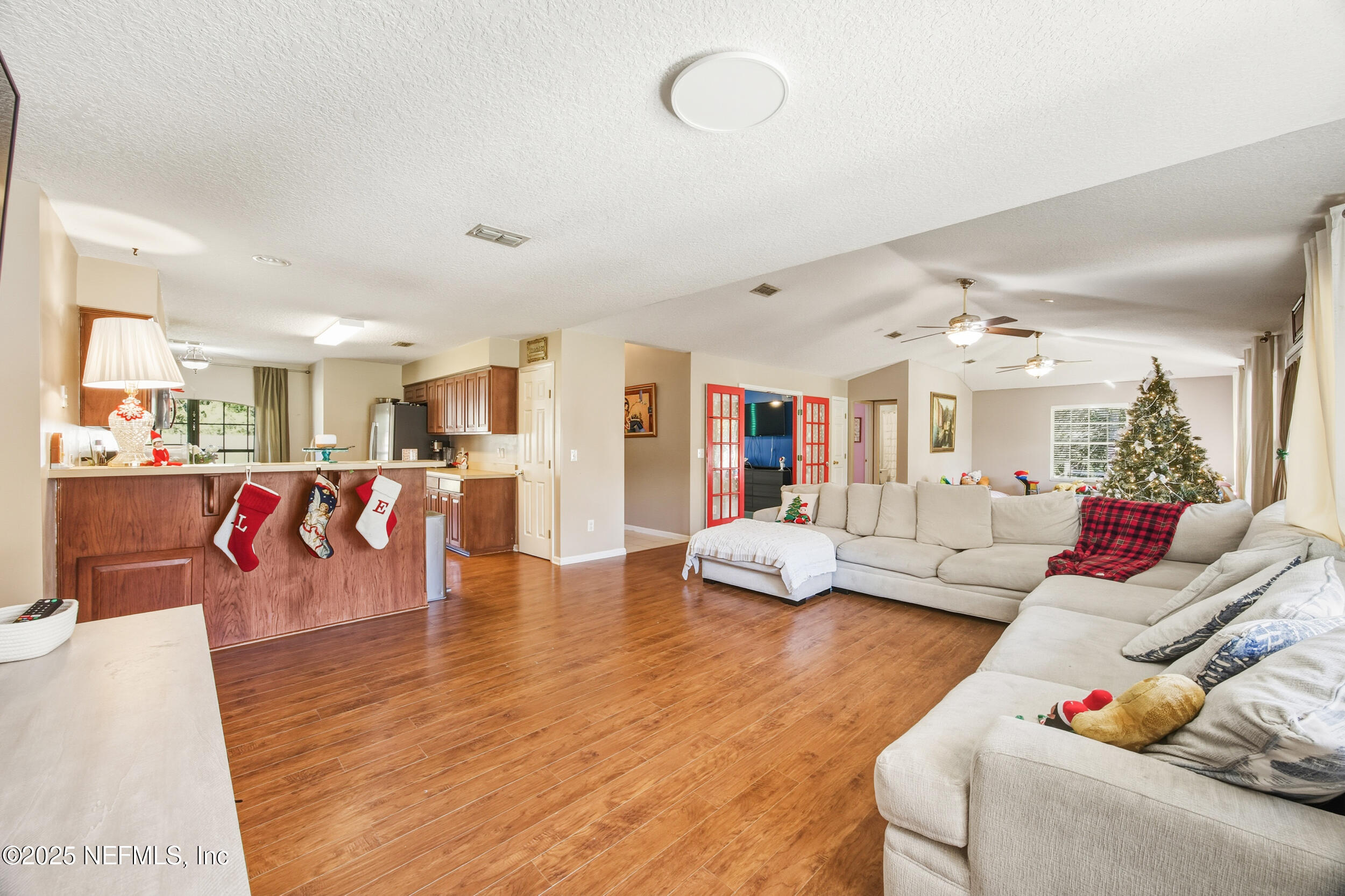 5720 Younis Road South Jacksonville, FL 32218 - Photo 25 of 34 a living room with furniture and kitchen view