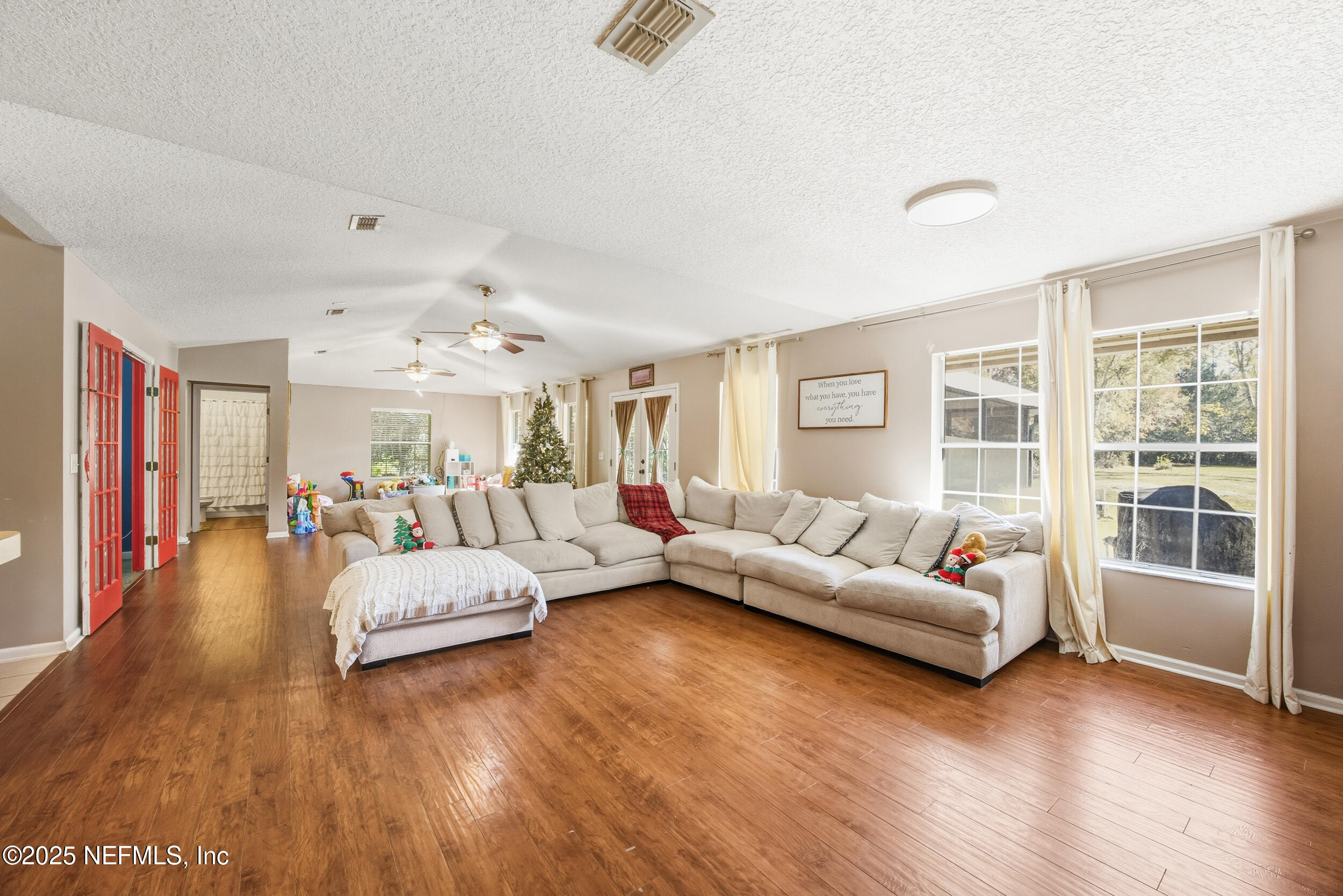 5720 Younis Road South Jacksonville, FL 32218 - Photo 26 of 34 a living room with furniture and a large window