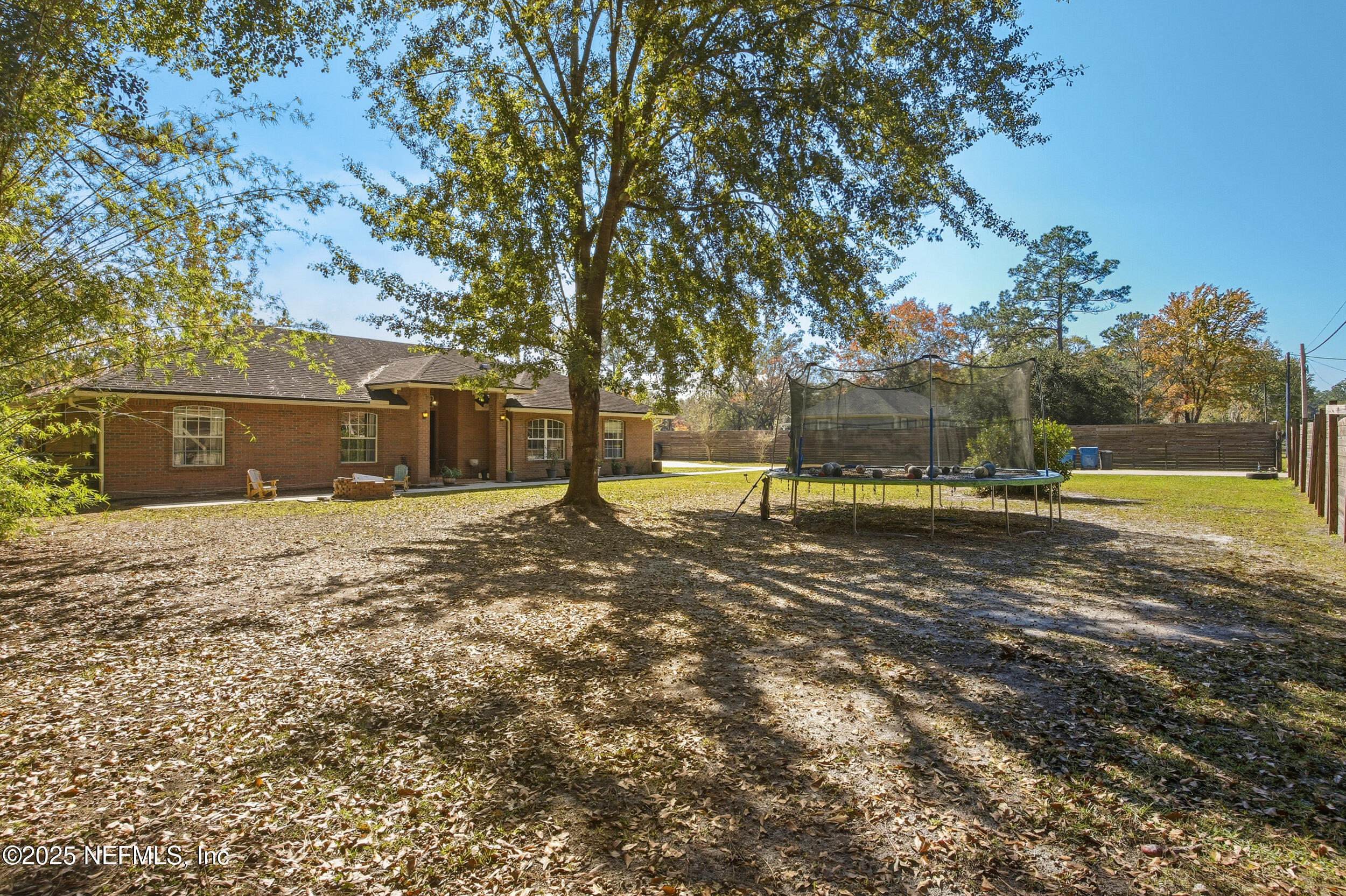 5720 Younis Road South Jacksonville, FL 32218 - Photo 5 of 34 a view of a yard with a tree