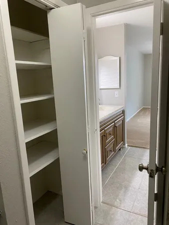 a view of small space with racks on the wall