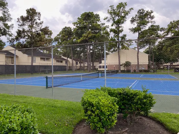 a front view of a house with swimming pool