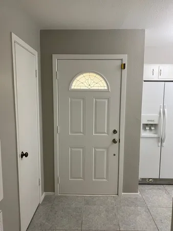 a view of entryway with white walls